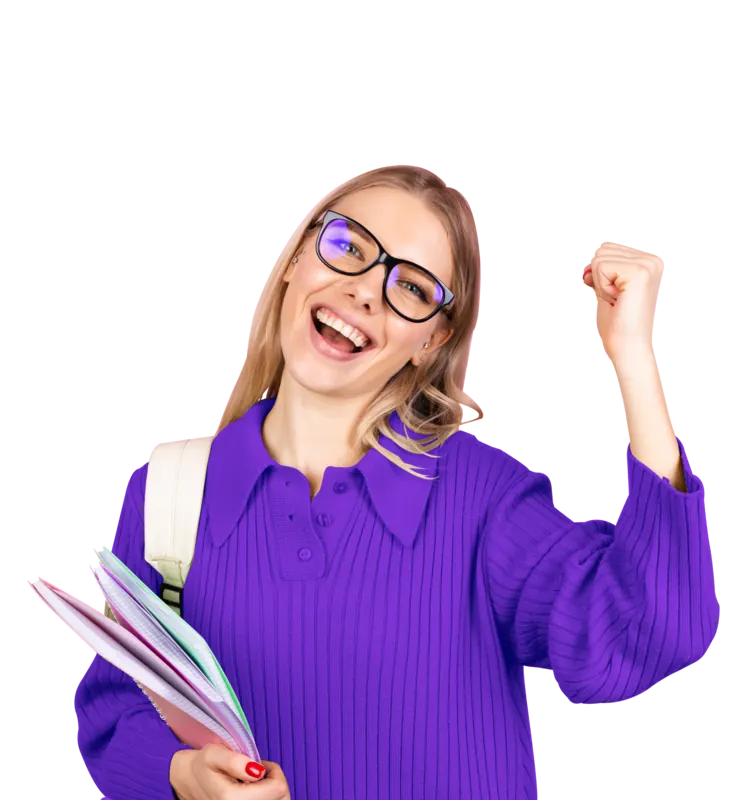 A smiling student in glasses holding her notebooks and raising a fist in celebration
